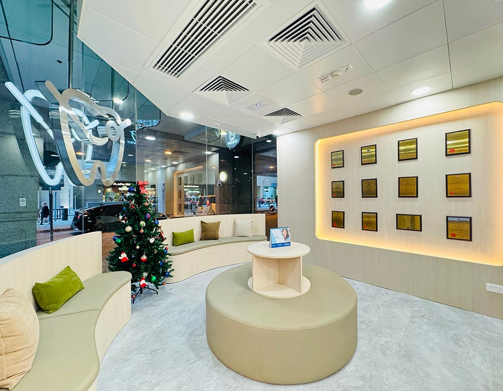 Modern dental clinic waiting area with Christmas tree